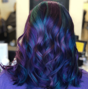 Woman with blue and purple wavy hair