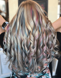 Rainbow colored curled hair