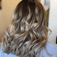 Woman with blond curly hair