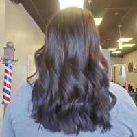 A woman with long, wavy hair