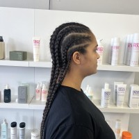 A woman wit long, braided hair
